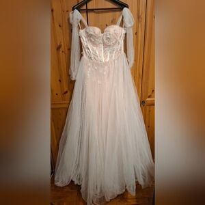 Elegant Sheer White Gown with Floral Details